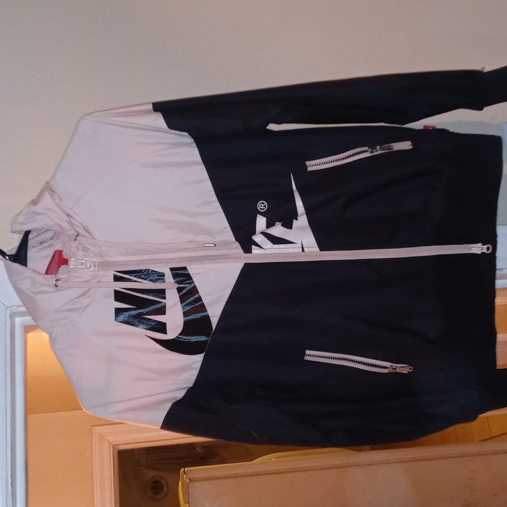 Xs light pink and black nike windbreaker